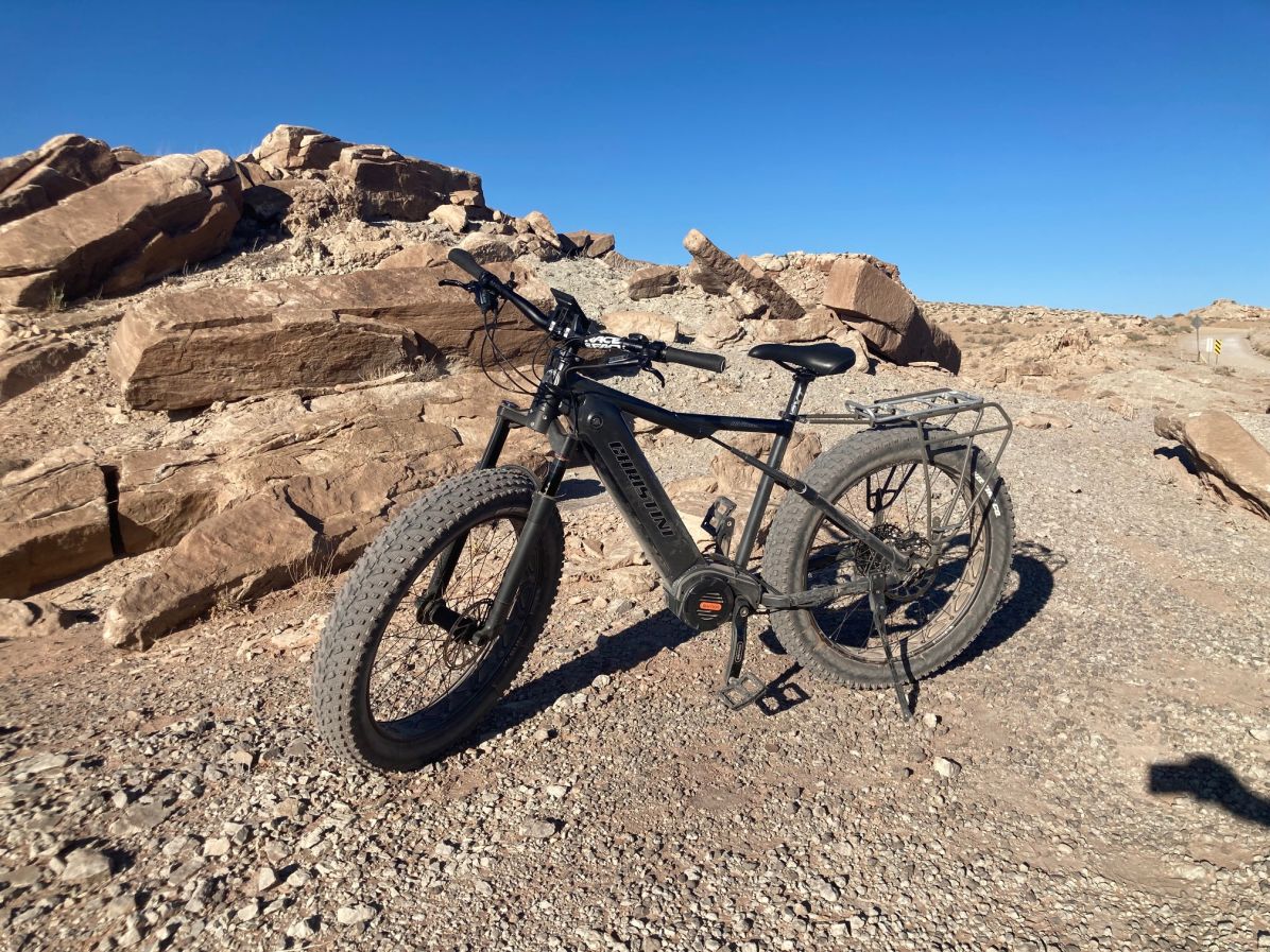 CHRISTINI AWD Fat E-5 i riding in Moab two-wheel drive hunting e-bike